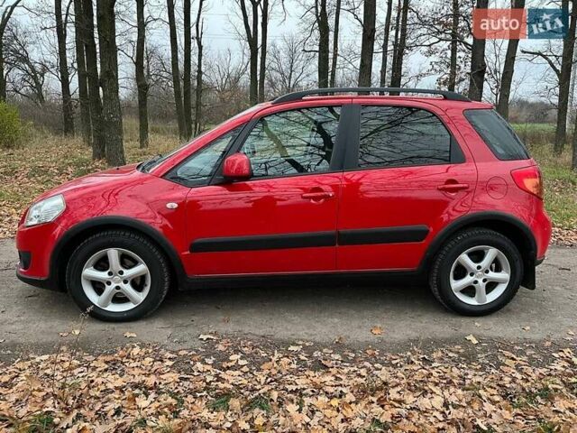 Красный Сузуки СХ4, объемом двигателя 1.6 л и пробегом 101 тыс. км за 7700 $, фото 1 на Automoto.ua