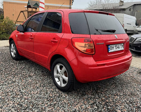 Красный Сузуки СХ4, объемом двигателя 1.59 л и пробегом 183 тыс. км за 6700 $, фото 3 на Automoto.ua
