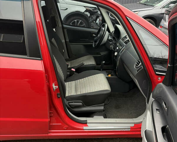 Красный Сузуки СХ4, объемом двигателя 1.59 л и пробегом 200 тыс. км за 5500 $, фото 5 на Automoto.ua