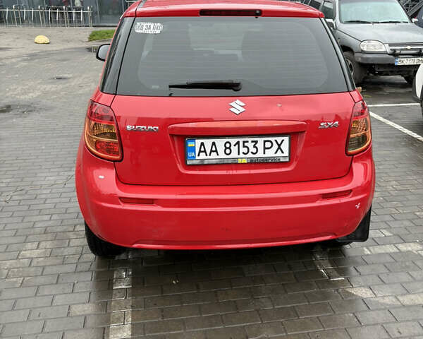 Красный Сузуки СХ4, объемом двигателя 1.59 л и пробегом 200 тыс. км за 5500 $, фото 3 на Automoto.ua