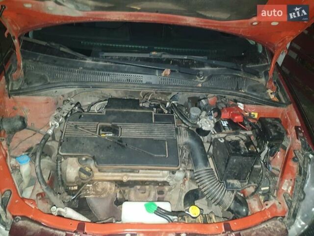 Красный Сузуки СХ4, объемом двигателя 1.6 л и пробегом 195 тыс. км за 4300 $, фото 3 на Automoto.ua