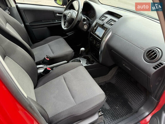 Червоний Сузукі СХ4, об'ємом двигуна 1.6 л та пробігом 181 тис. км за 6200 $, фото 13 на Automoto.ua