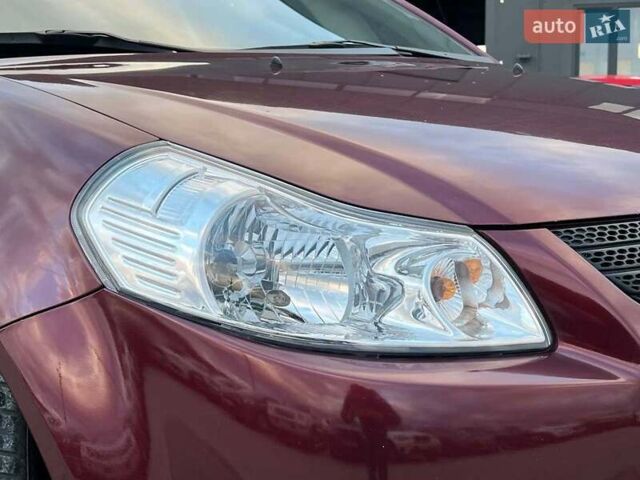 Сузуки СХ4 2010 в Львове на Automoto.ua Красный Сузуки СХ4, объемом двигателя 2 л и пробегом 231 тыс. км за 5190 $, фото 11 на Automoto.ua