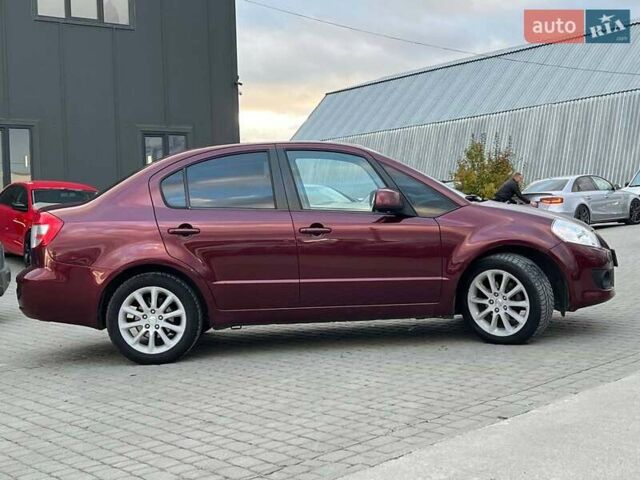 Сузуки СХ4 2010 в Львове на Automoto.ua Красный Сузуки СХ4, объемом двигателя 2 л и пробегом 231 тыс. км за 5190 $, фото 7 на Automoto.ua