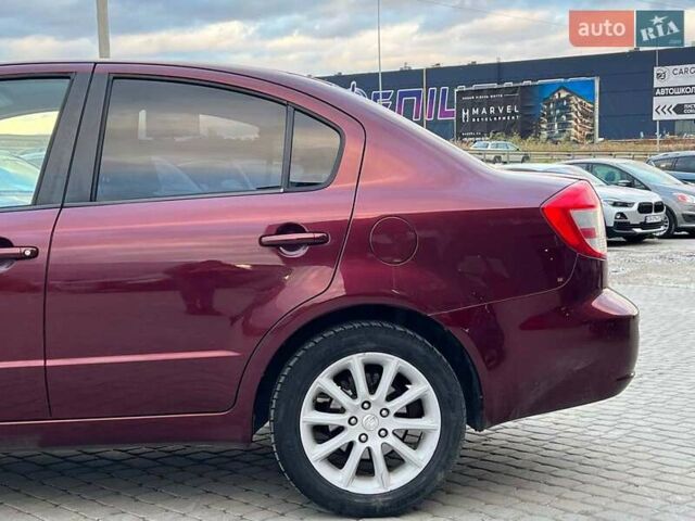 Сузуки СХ4 2010 в Львове на Automoto.ua Красный Сузуки СХ4, объемом двигателя 2 л и пробегом 231 тыс. км за 5190 $, фото 3 на Automoto.ua
