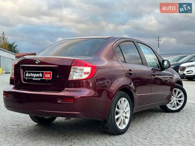 Сузуки СХ4 2010 в Львове на Automoto.ua Красный Сузуки СХ4, объемом двигателя 2 л и пробегом 231 тыс. км за 5190 $, фото 5 на Automoto.ua