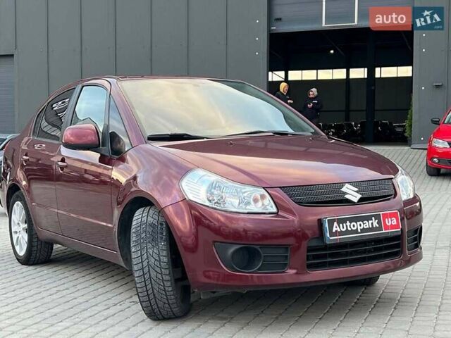 Сузуки СХ4 2010 в Львове на Automoto.ua Красный Сузуки СХ4, объемом двигателя 2 л и пробегом 231 тыс. км за 5190 $, фото 9 на Automoto.ua