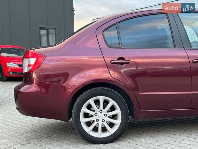 Сузуки СХ4 2010 в Львове на Automoto.ua Красный Сузуки СХ4, объемом двигателя 2 л и пробегом 231 тыс. км за 5190 $, фото 6 на Automoto.ua