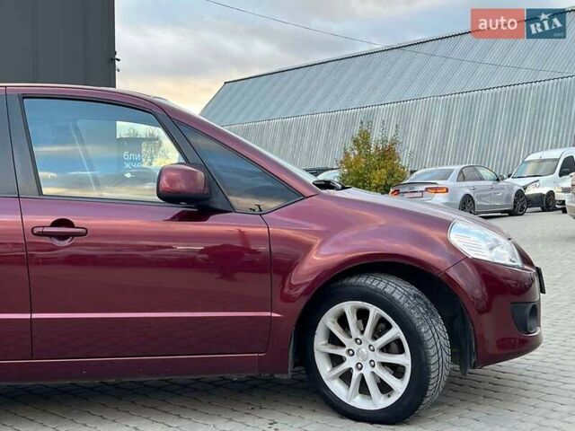 Сузуки СХ4 2010 в Львове на Automoto.ua Красный Сузуки СХ4, объемом двигателя 2 л и пробегом 231 тыс. км за 5190 $, фото 8 на Automoto.ua