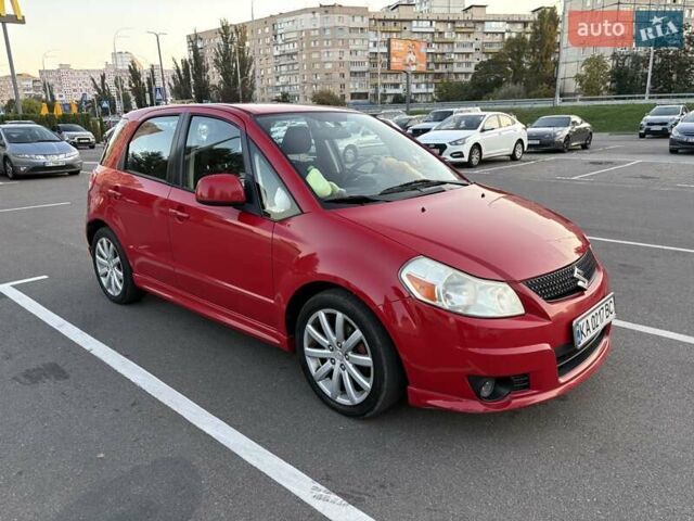 Красный Сузуки СХ4, объемом двигателя 2 л и пробегом 170 тыс. км за 8900 $, фото 3 на Automoto.ua