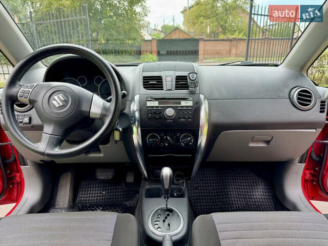 Червоний Сузукі СХ4, об'ємом двигуна 1.6 л та пробігом 166 тис. км за 9000 $, фото 31 на Automoto.ua