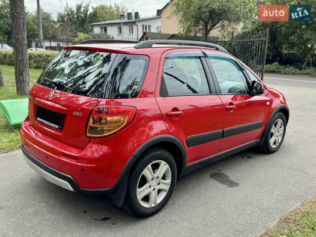 Червоний Сузукі СХ4, об'ємом двигуна 1.6 л та пробігом 166 тис. км за 9000 $, фото 13 на Automoto.ua