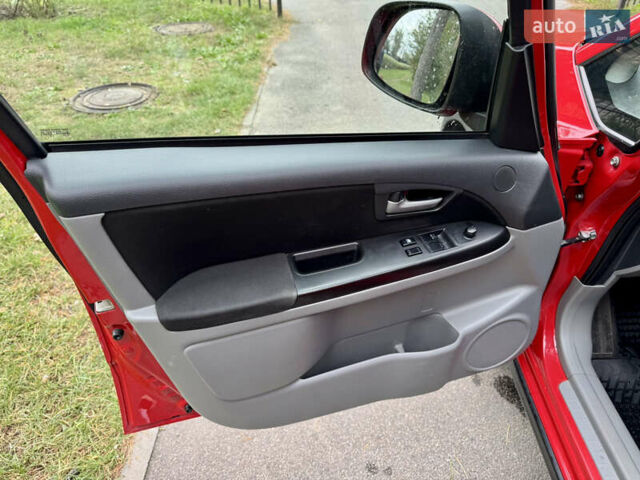 Червоний Сузукі СХ4, об'ємом двигуна 1.6 л та пробігом 166 тис. км за 9000 $, фото 23 на Automoto.ua