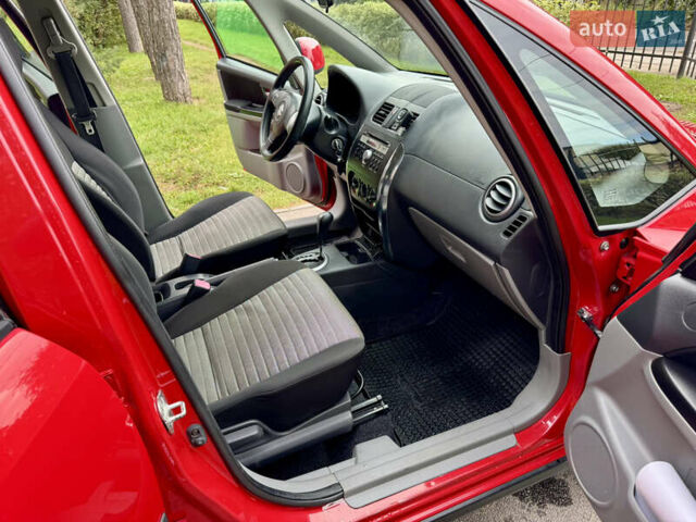 Червоний Сузукі СХ4, об'ємом двигуна 1.6 л та пробігом 166 тис. км за 9000 $, фото 27 на Automoto.ua