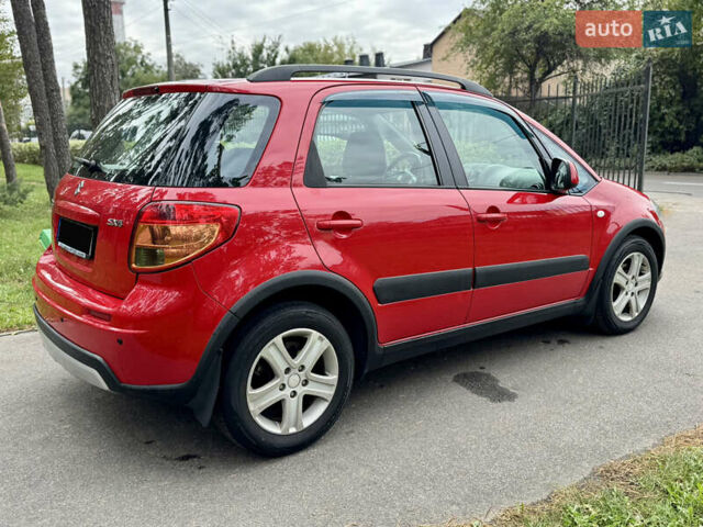 Червоний Сузукі СХ4, об'ємом двигуна 1.6 л та пробігом 166 тис. км за 9000 $, фото 12 на Automoto.ua