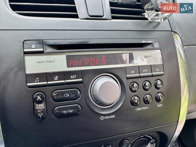 Червоний Сузукі СХ4, об'ємом двигуна 1.6 л та пробігом 166 тис. км за 9000 $, фото 41 на Automoto.ua