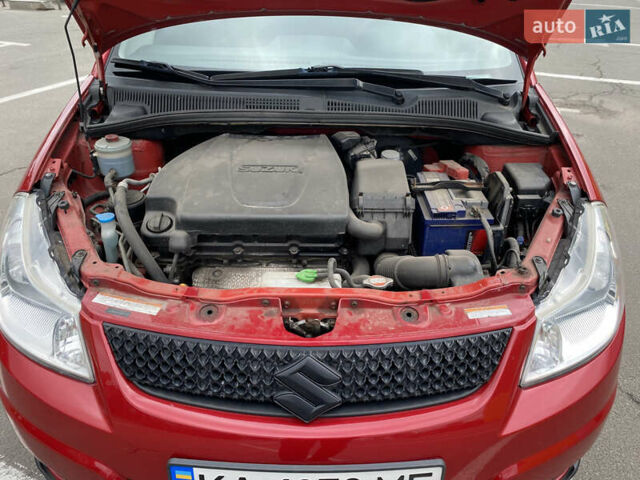 Красный Сузуки СХ4, объемом двигателя 2 л и пробегом 315 тыс. км за 8500 $, фото 8 на Automoto.ua