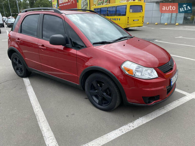 Красный Сузуки СХ4, объемом двигателя 2 л и пробегом 315 тыс. км за 8500 $, фото 7 на Automoto.ua