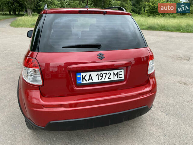 Красный Сузуки СХ4, объемом двигателя 2 л и пробегом 315 тыс. км за 8000 $, фото 4 на Automoto.ua