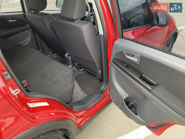 Красный Сузуки СХ4, объемом двигателя 2 л и пробегом 315 тыс. км за 8500 $, фото 12 на Automoto.ua