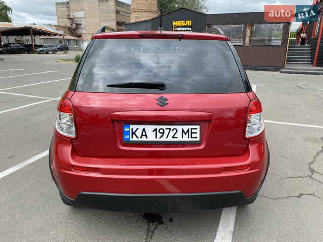Красный Сузуки СХ4, объемом двигателя 2 л и пробегом 315 тыс. км за 8500 $, фото 4 на Automoto.ua