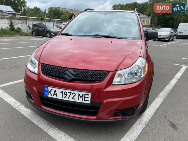 Красный Сузуки СХ4, объемом двигателя 2 л и пробегом 315 тыс. км за 8000 $, фото 1 на Automoto.ua