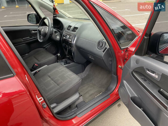 Красный Сузуки СХ4, объемом двигателя 2 л и пробегом 315 тыс. км за 8500 $, фото 13 на Automoto.ua