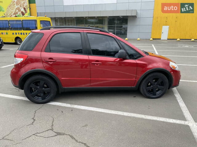 Красный Сузуки СХ4, объемом двигателя 2 л и пробегом 315 тыс. км за 8500 $, фото 6 на Automoto.ua
