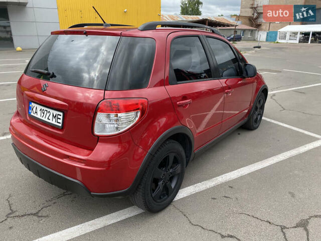 Красный Сузуки СХ4, объемом двигателя 2 л и пробегом 315 тыс. км за 8500 $, фото 5 на Automoto.ua