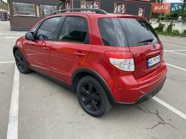 Красный Сузуки СХ4, объемом двигателя 2 л и пробегом 315 тыс. км за 8500 $, фото 3 на Automoto.ua