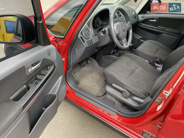 Красный Сузуки СХ4, объемом двигателя 2 л и пробегом 315 тыс. км за 8500 $, фото 9 на Automoto.ua