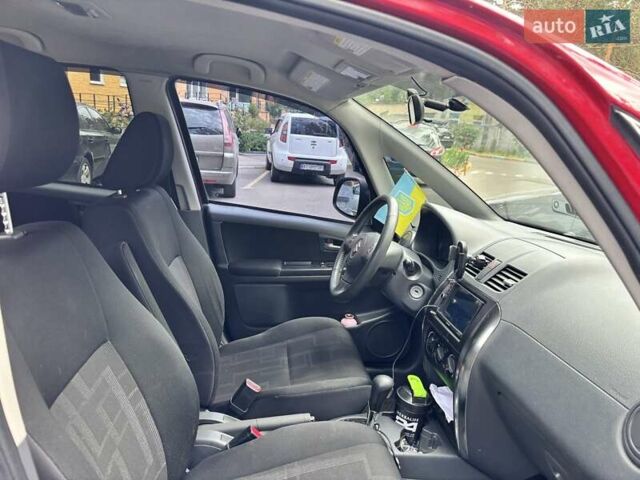 Червоний Сузукі СХ4, об'ємом двигуна 2 л та пробігом 300 тис. км за 10000 $, фото 4 на Automoto.ua