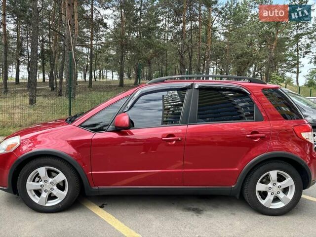 Червоний Сузукі СХ4, об'ємом двигуна 2 л та пробігом 300 тис. км за 10000 $, фото 2 на Automoto.ua