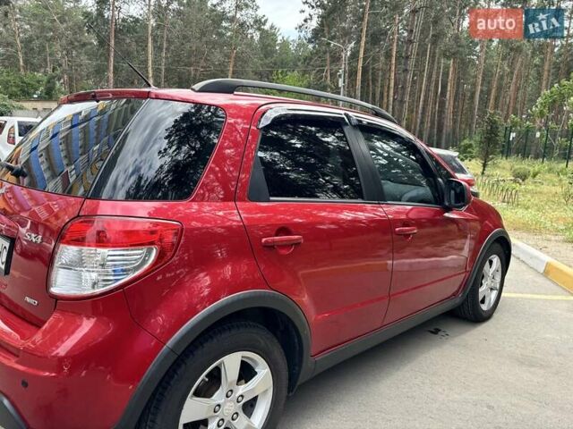 Червоний Сузукі СХ4, об'ємом двигуна 2 л та пробігом 300 тис. км за 10000 $, фото 3 на Automoto.ua