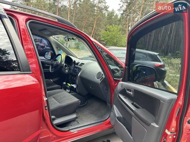 Червоний Сузукі СХ4, об'ємом двигуна 2 л та пробігом 300 тис. км за 10000 $, фото 1 на Automoto.ua