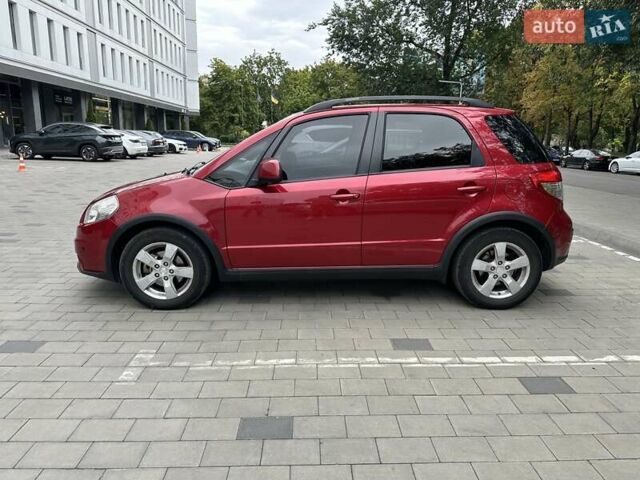 Червоний Сузукі СХ4, об'ємом двигуна 2 л та пробігом 200 тис. км за 9500 $, фото 10 на Automoto.ua