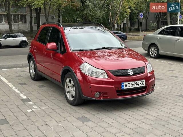 Червоний Сузукі СХ4, об'ємом двигуна 2 л та пробігом 200 тис. км за 9500 $, фото 2 на Automoto.ua