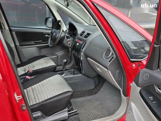 Червоний Сузукі СХ4, об'ємом двигуна 1.6 л та пробігом 167 тис. км за 10900 $, фото 9 на Automoto.ua