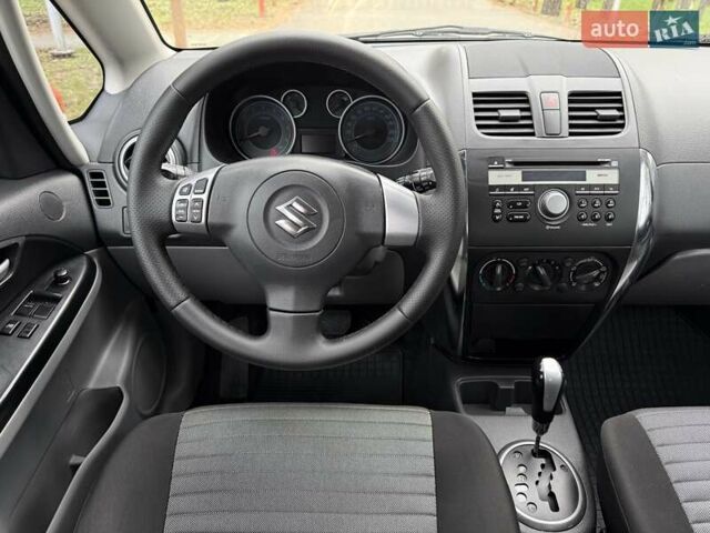 Червоний Сузукі СХ4, об'ємом двигуна 1.6 л та пробігом 167 тис. км за 10750 $, фото 18 на Automoto.ua