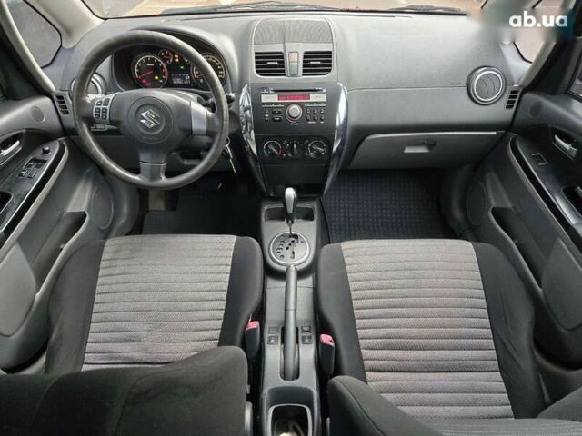 Червоний Сузукі СХ4, об'ємом двигуна 1.6 л та пробігом 167 тис. км за 10900 $, фото 19 на Automoto.ua