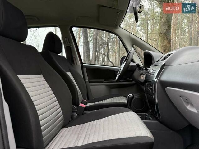 Красный Сузуки СХ4, объемом двигателя 1.6 л и пробегом 167 тыс. км за 10650 $, фото 22 на Automoto.ua