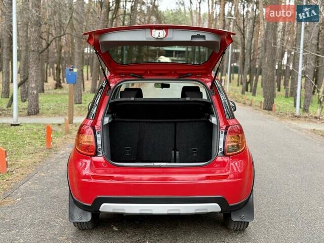 Красный Сузуки СХ4, объемом двигателя 1.6 л и пробегом 167 тыс. км за 10650 $, фото 8 на Automoto.ua