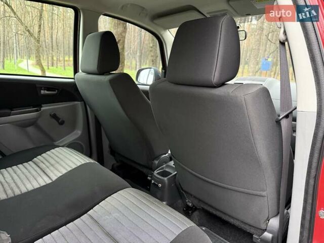 Красный Сузуки СХ4, объемом двигателя 1.6 л и пробегом 167 тыс. км за 10650 $, фото 28 на Automoto.ua