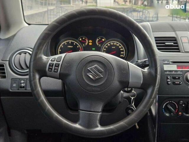 Червоний Сузукі СХ4, об'ємом двигуна 1.6 л та пробігом 167 тис. км за 10900 $, фото 20 на Automoto.ua