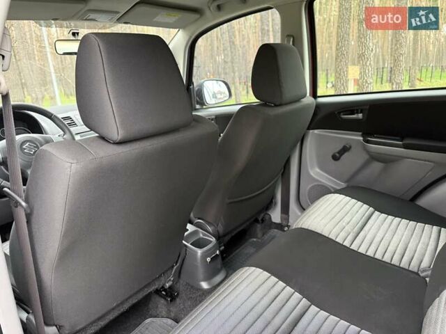 Червоний Сузукі СХ4, об'ємом двигуна 1.6 л та пробігом 167 тис. км за 10750 $, фото 14 на Automoto.ua