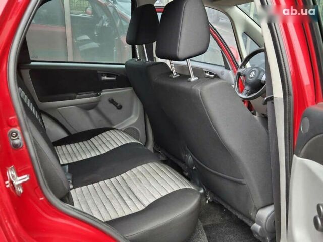 Червоний Сузукі СХ4, об'ємом двигуна 1.6 л та пробігом 167 тис. км за 10900 $, фото 12 на Automoto.ua