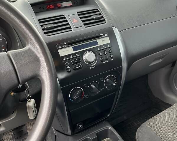 Сузуки СХ4, объемом двигателя 1.6 л и пробегом 236 тыс. км за 4900 $, фото 9 на Automoto.ua