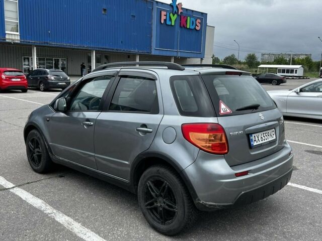 Серый Сузуки СХ4, объемом двигателя 1.6 л и пробегом 200 тыс. км за 4000 $, фото 2 на Automoto.ua
