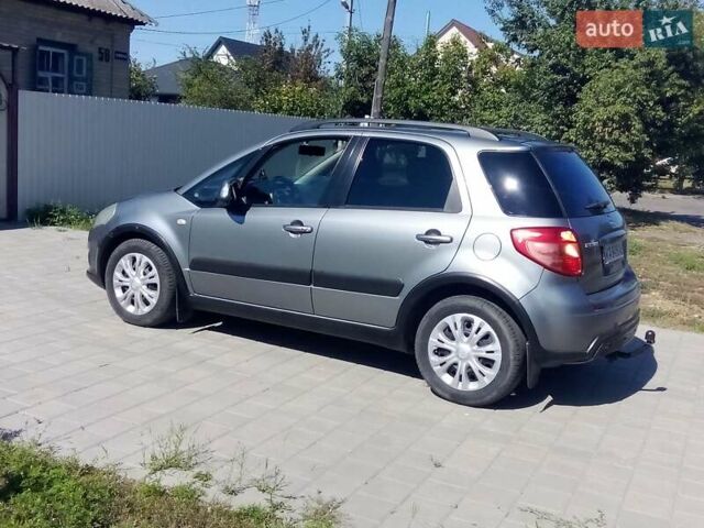 Серый Сузуки СХ4, объемом двигателя 1.4 л и пробегом 242 тыс. км за 7000 $, фото 5 на Automoto.ua