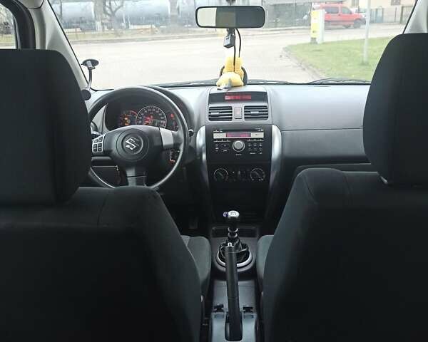 Серый Сузуки СХ4, объемом двигателя 1.56 л и пробегом 230 тыс. км за 6300 $, фото 6 на Automoto.ua